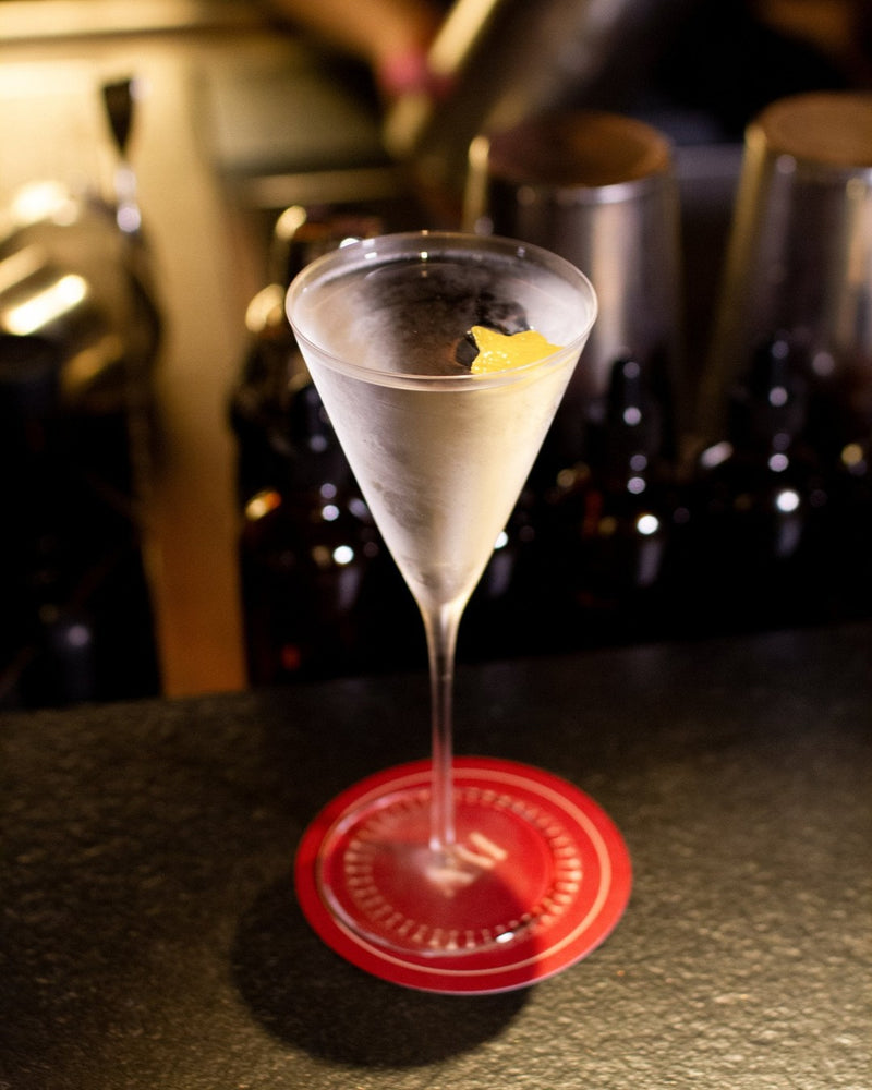 The Mineral Martini, an ice cold vodka martini in a frosted Martini glass with a lemon coin
